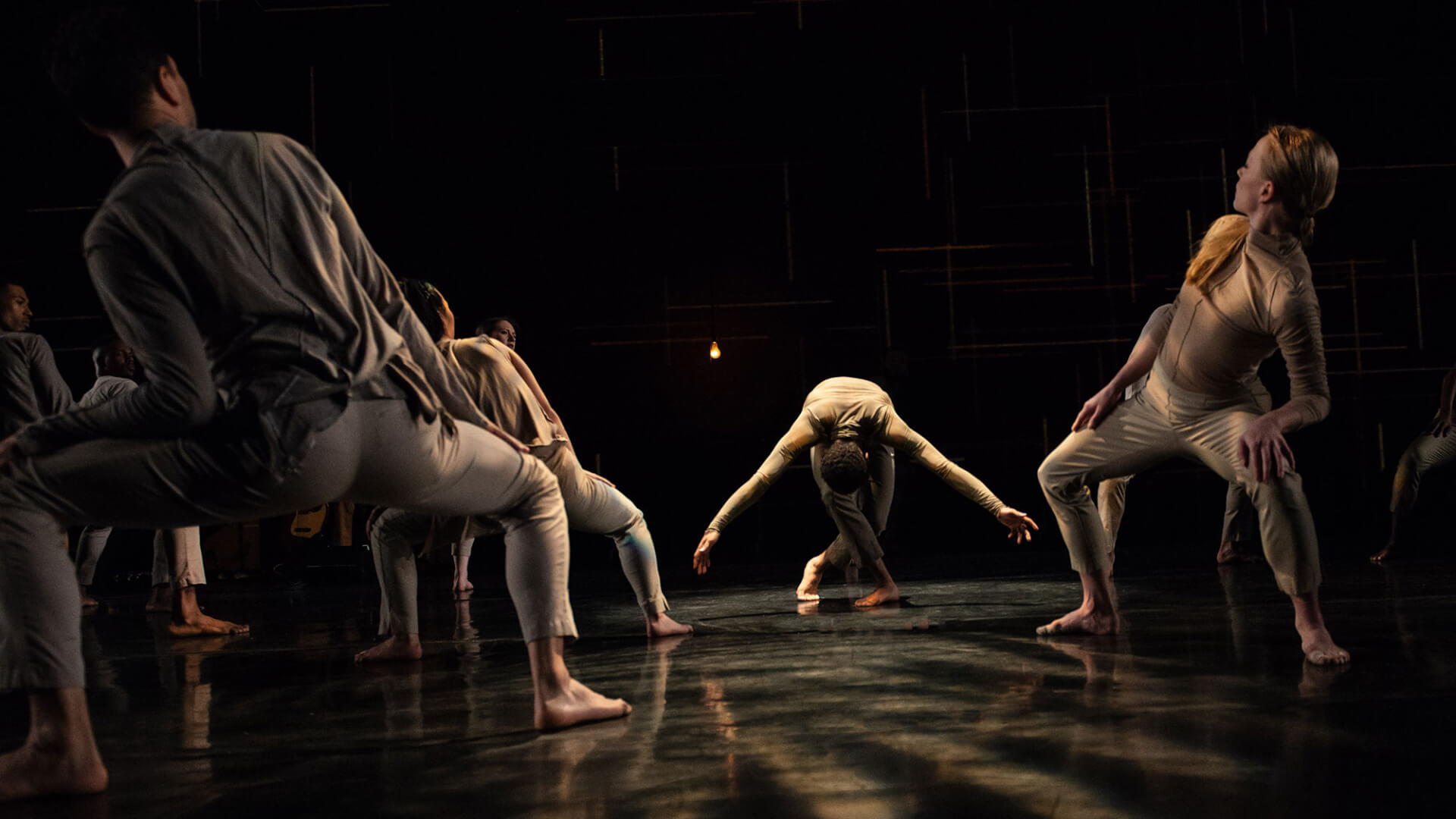 group of dancers on stage