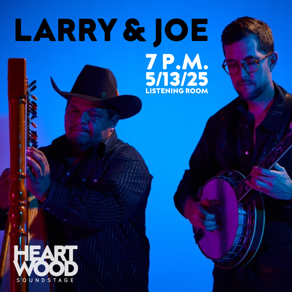 photo of Larry and Joe playing harp and banjo