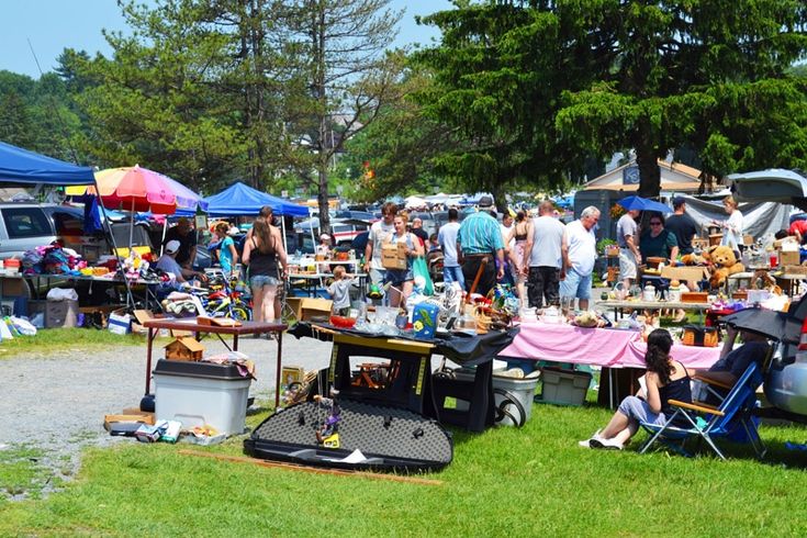 shoppers and vendors at flea market