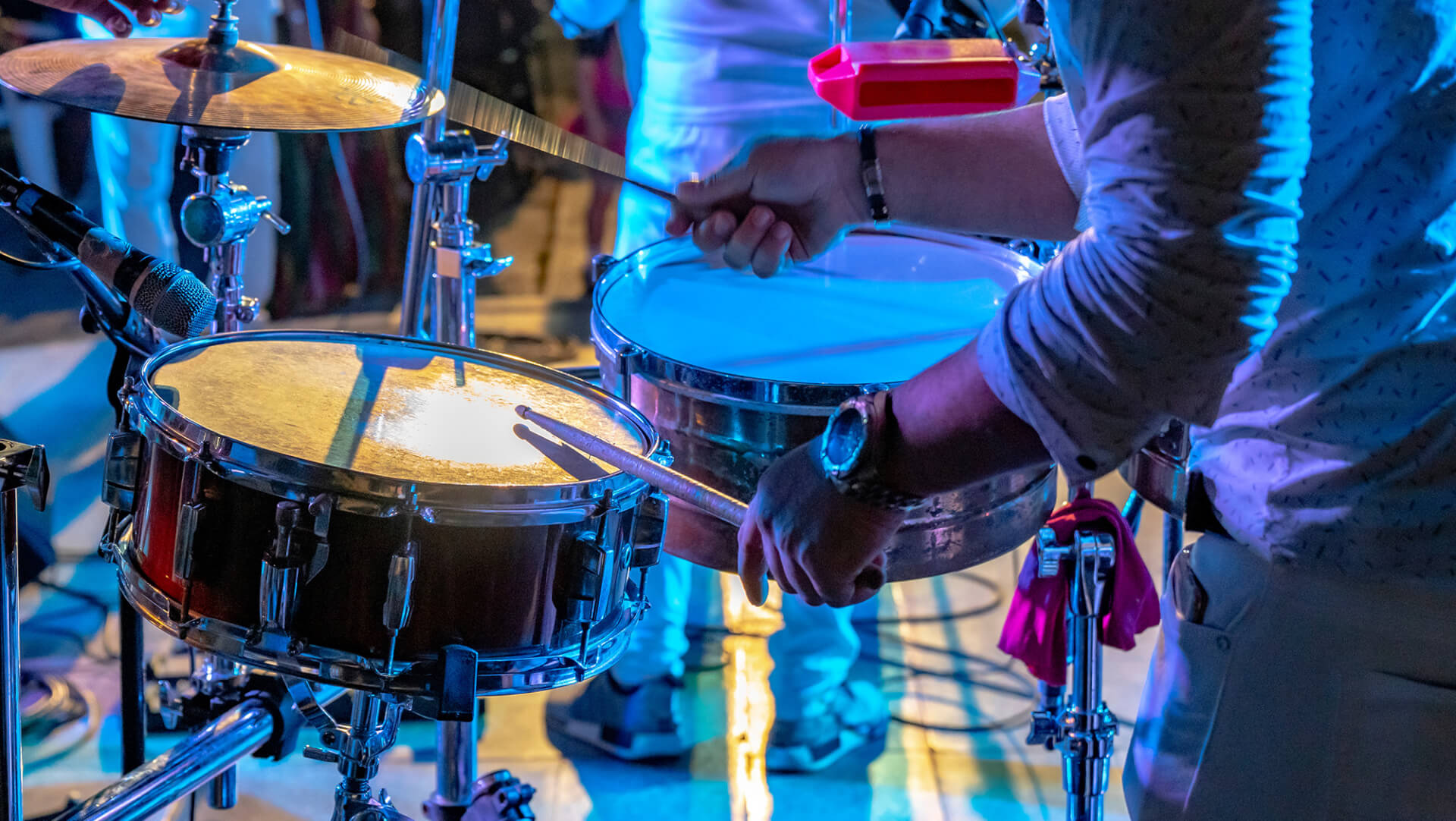 person playing drums