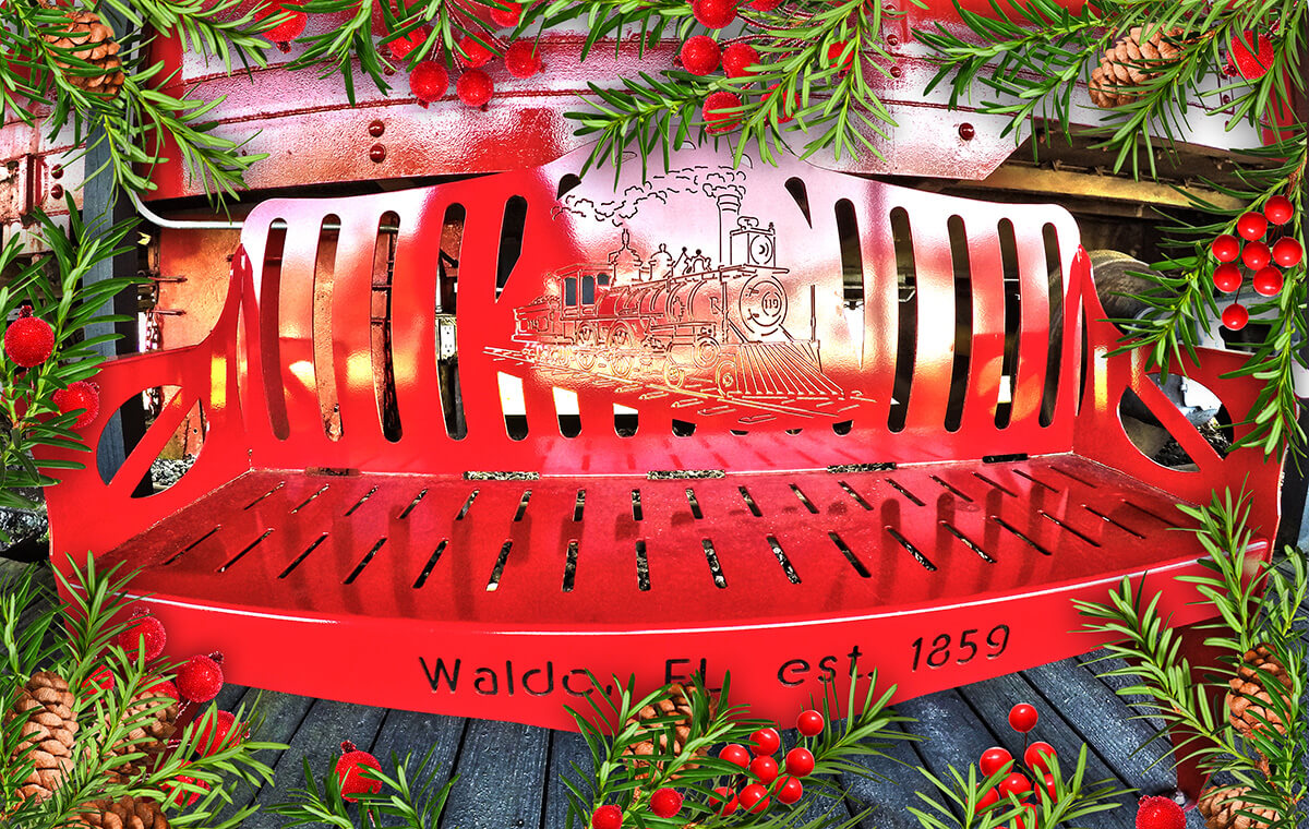 waldo train station museum bench with holiday decorations